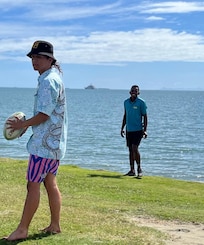 The kids playing with staff