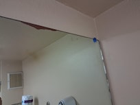 Mirror pieces chipped.