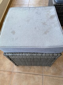 Outside cushions on furniture were all stained.