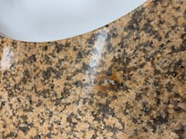 Cigarette burns on counter top