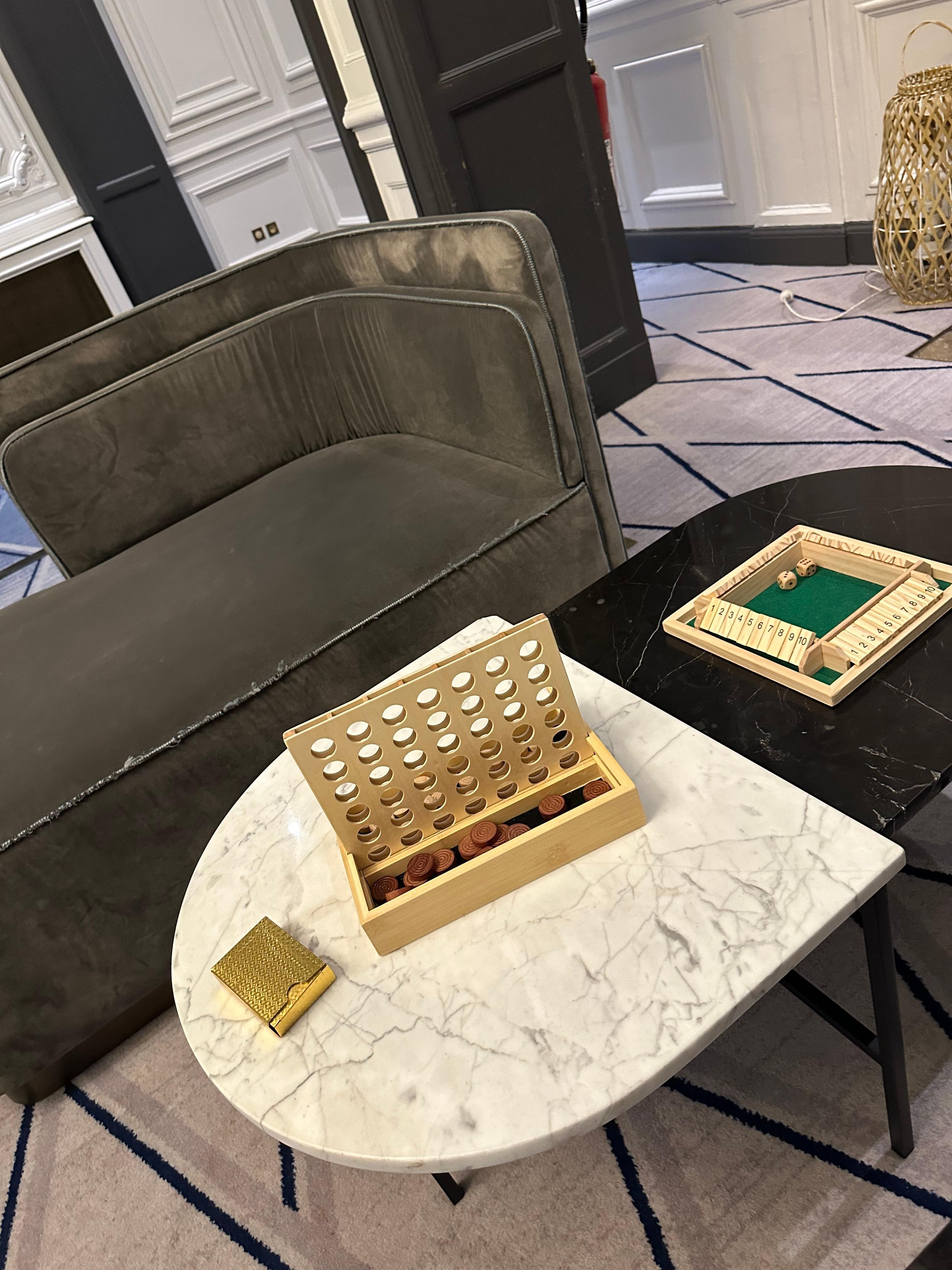 Board games are provided in a large beautiful salon