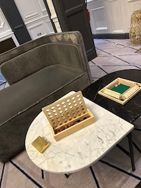 Board games are provided in a large beautiful salon