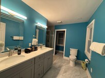 The primary bath is HUGE for the size of this house!