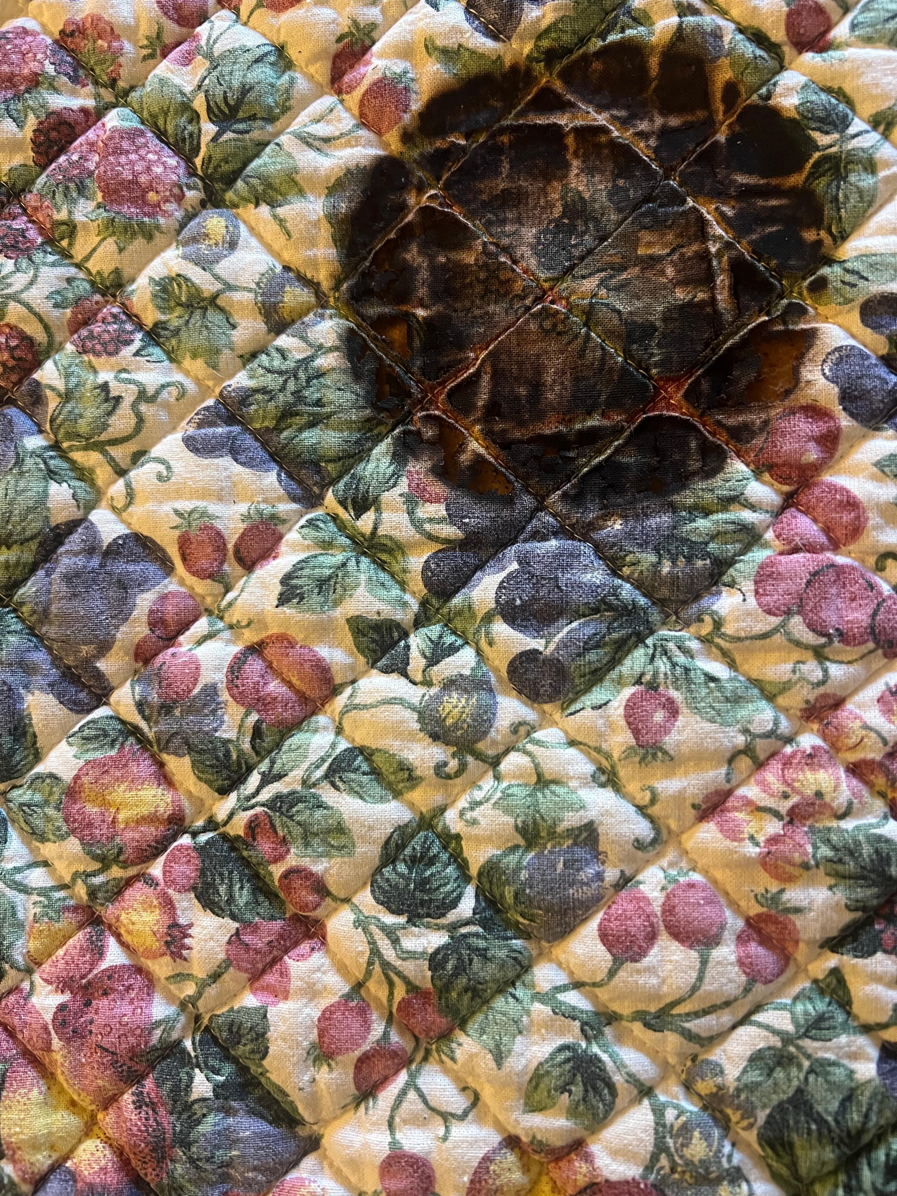 Coffee maker sized mark on mat. Presumably coffee maker spoilt so new one bought