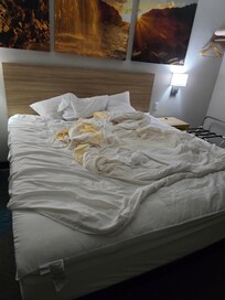 This was the condition of the bed when I walked in the room