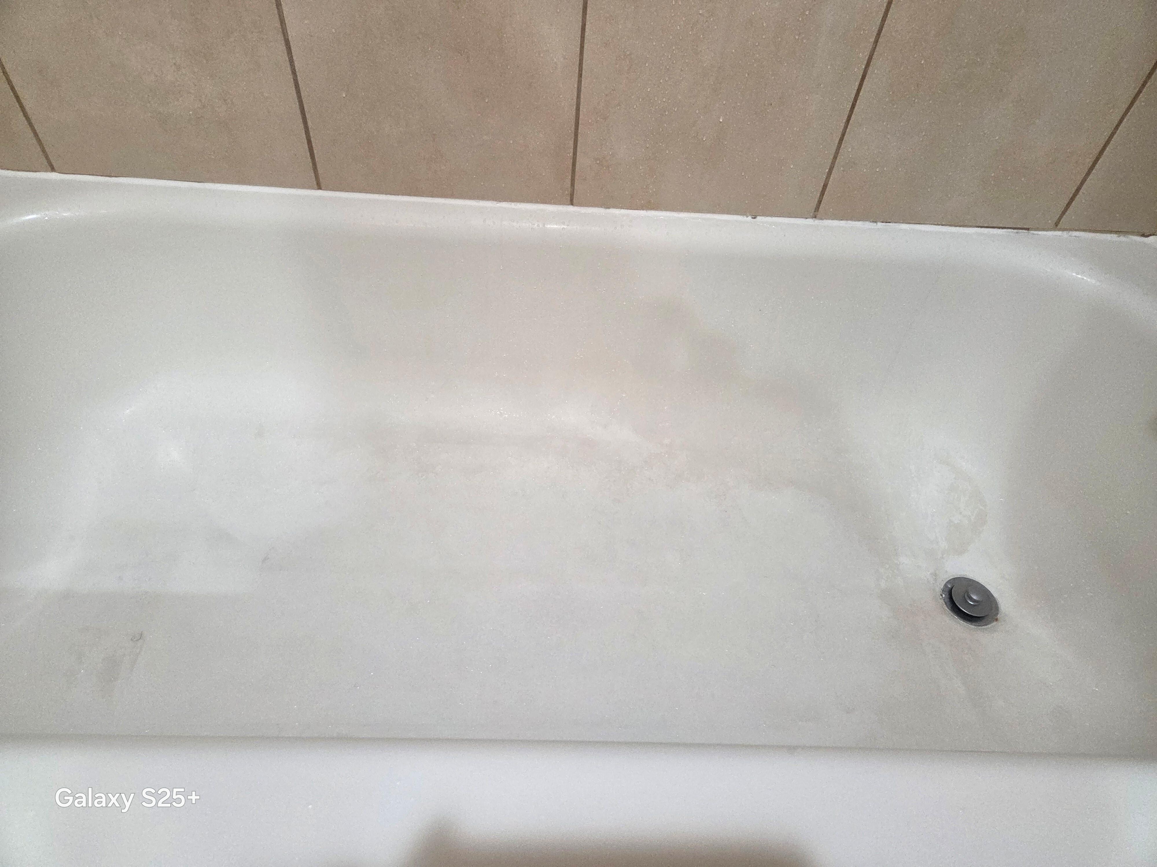 Stained and dirty tub and shower 