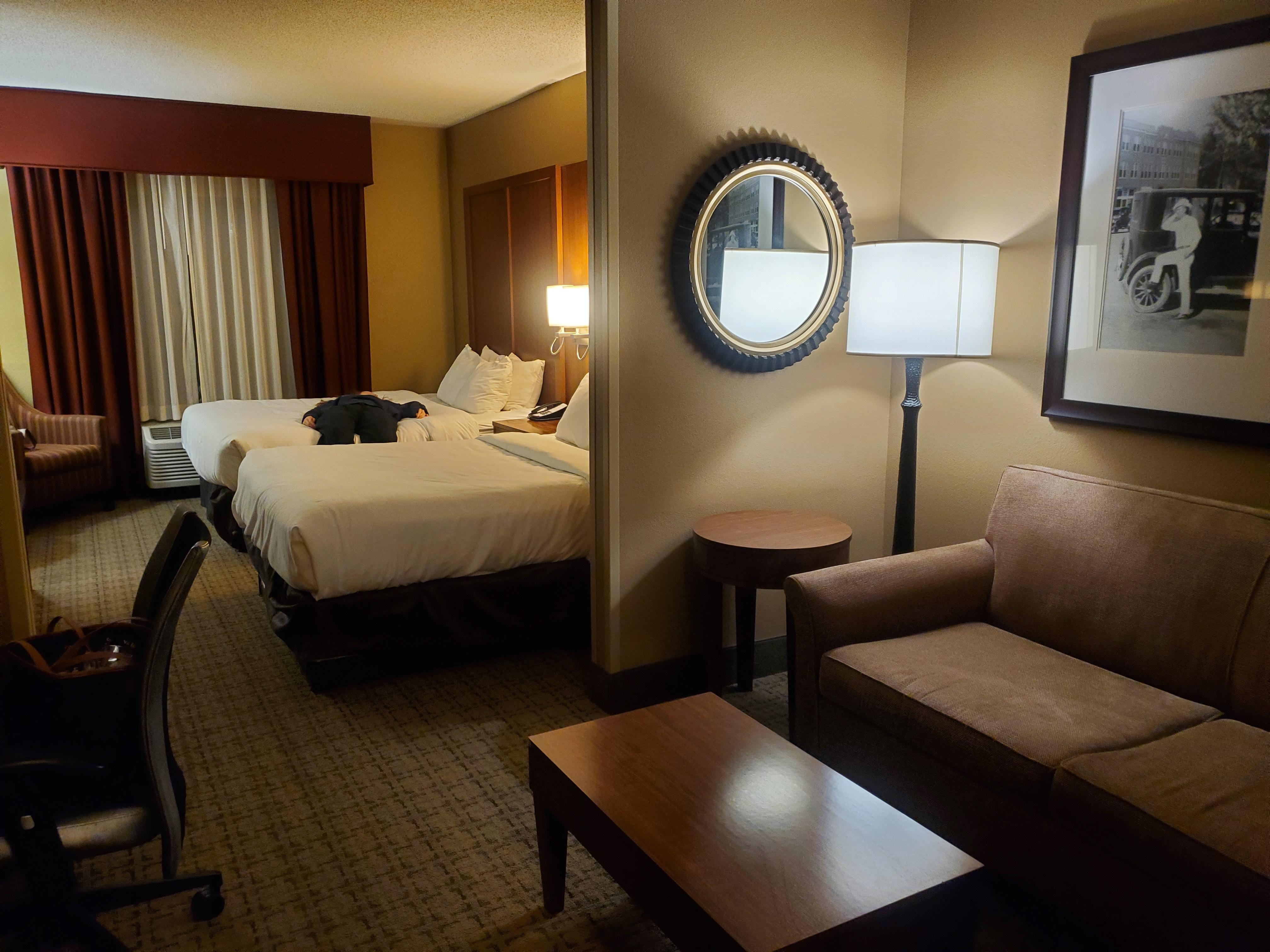 Double queen bed suite with sitting area, microwave and coffee area. 