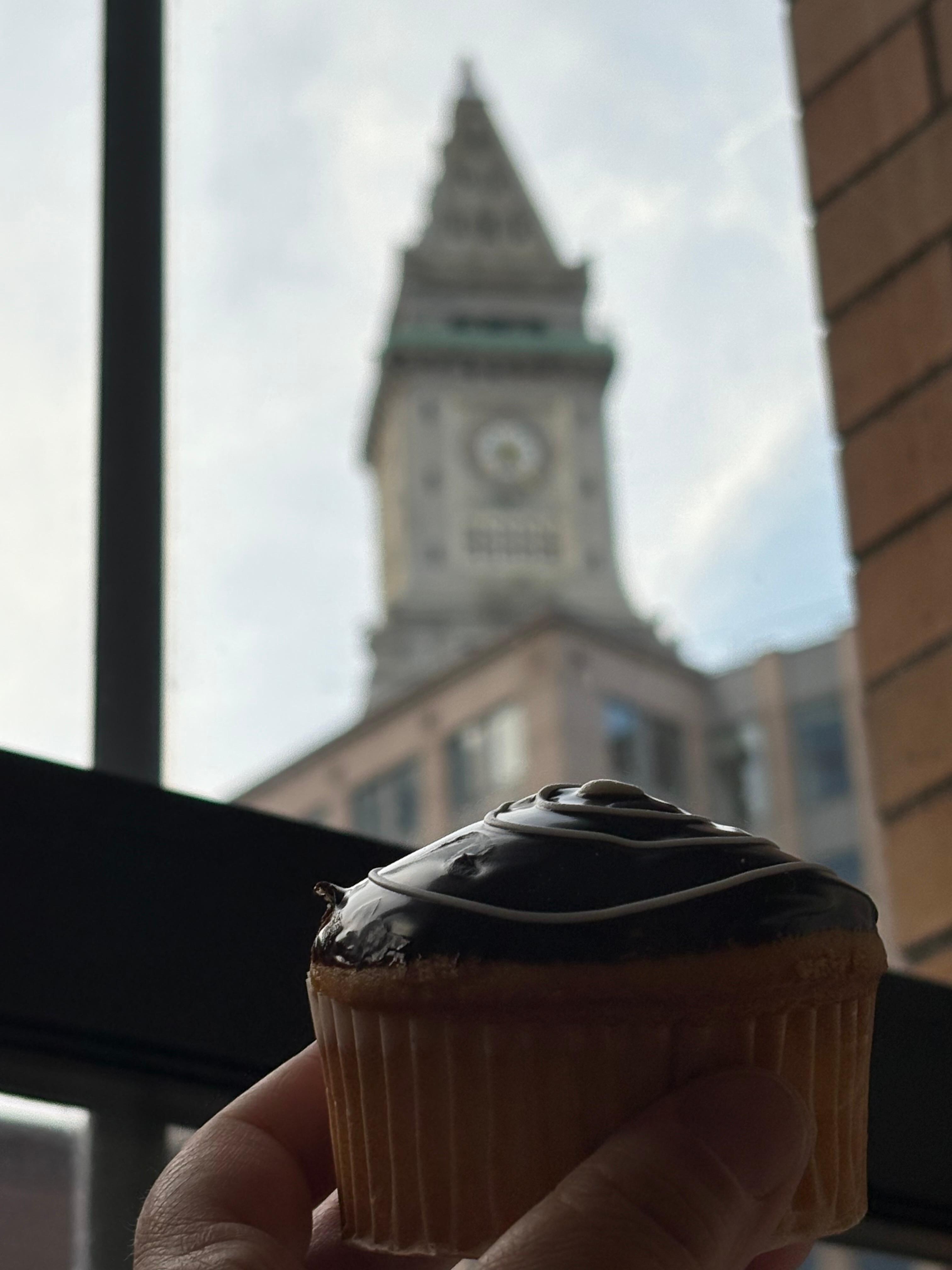 My Boston Crème cupcake from Modern Pastry in the window of our hotel (view from our room).