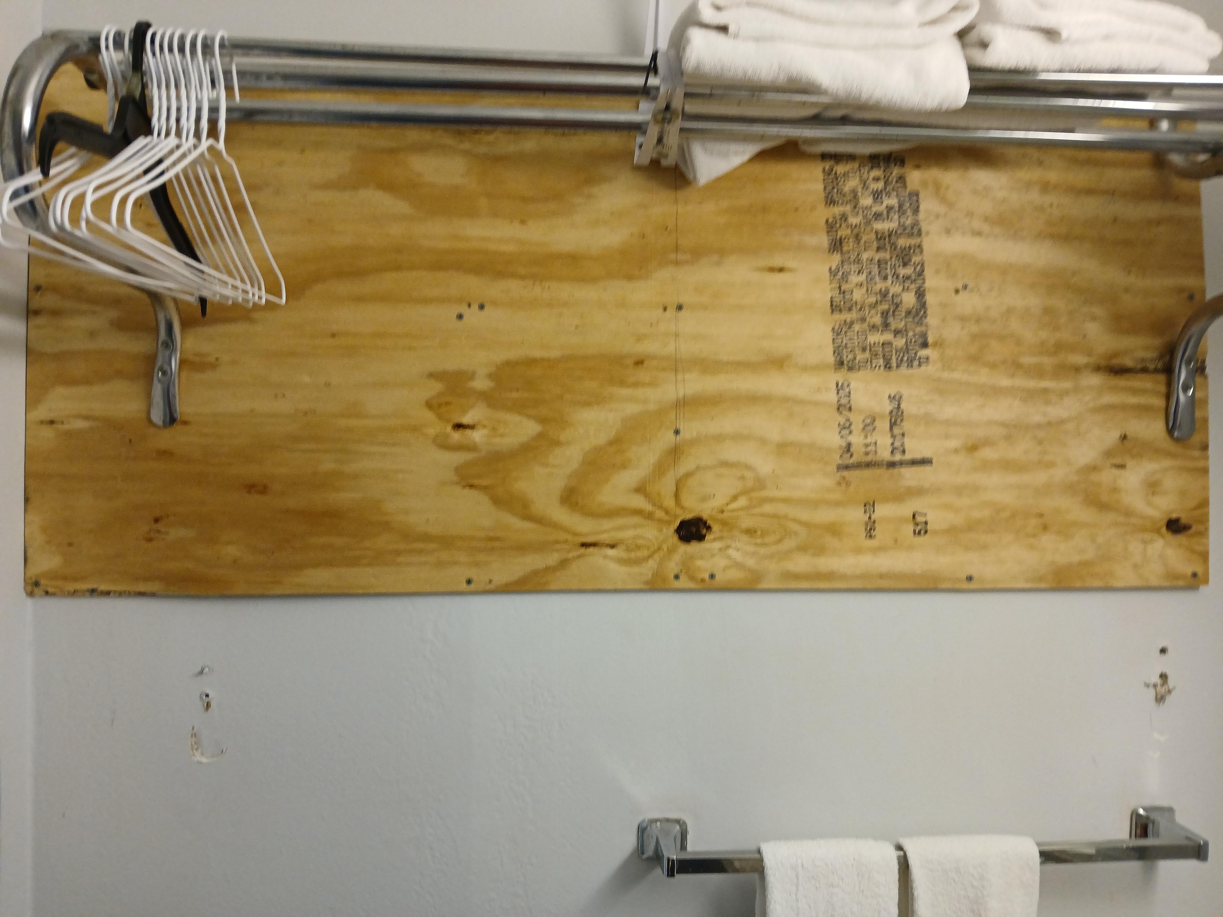 Plywood on the wall as a fix in the 1st room.