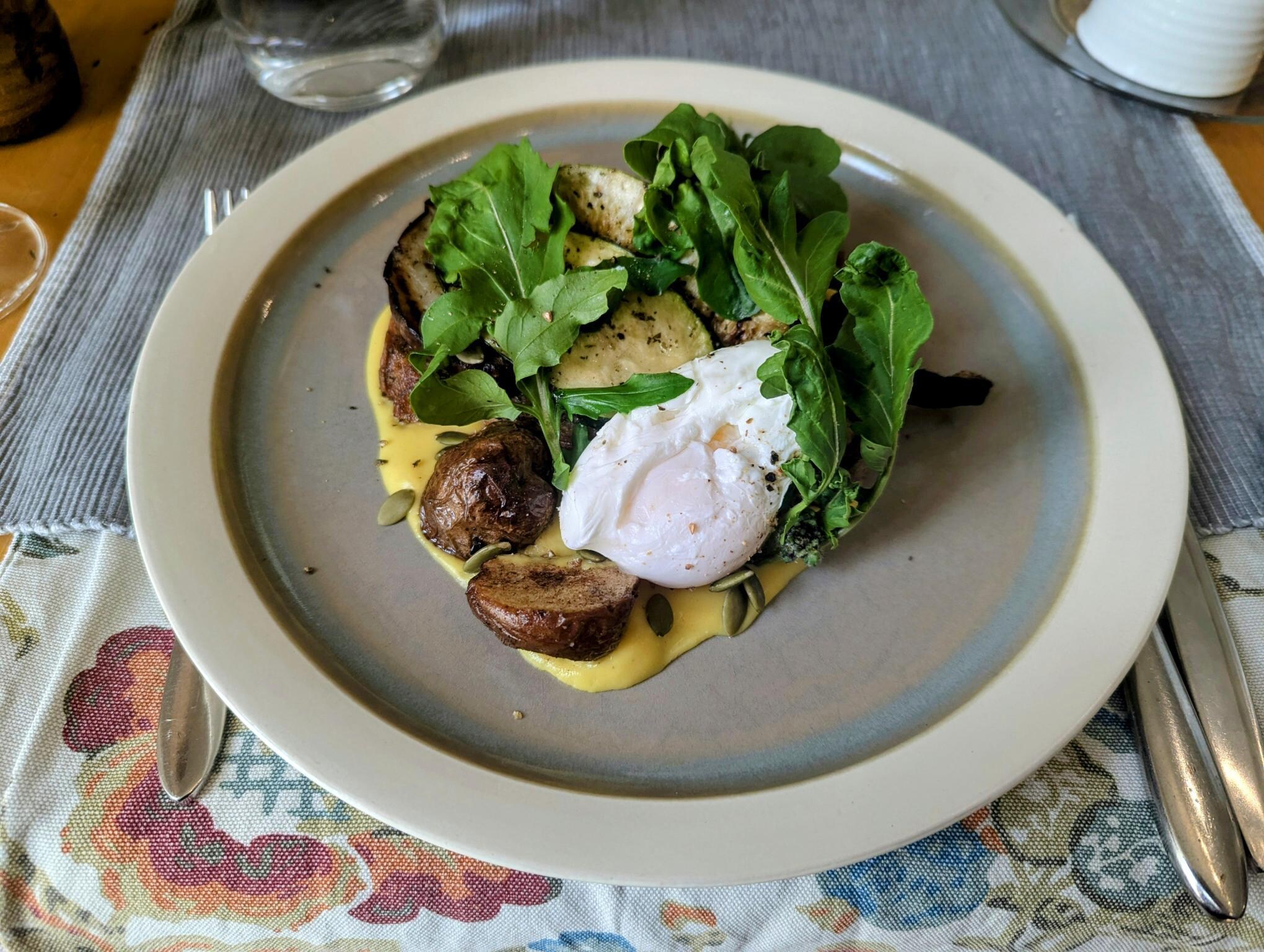 Grilled vegetables, poached egg over toast