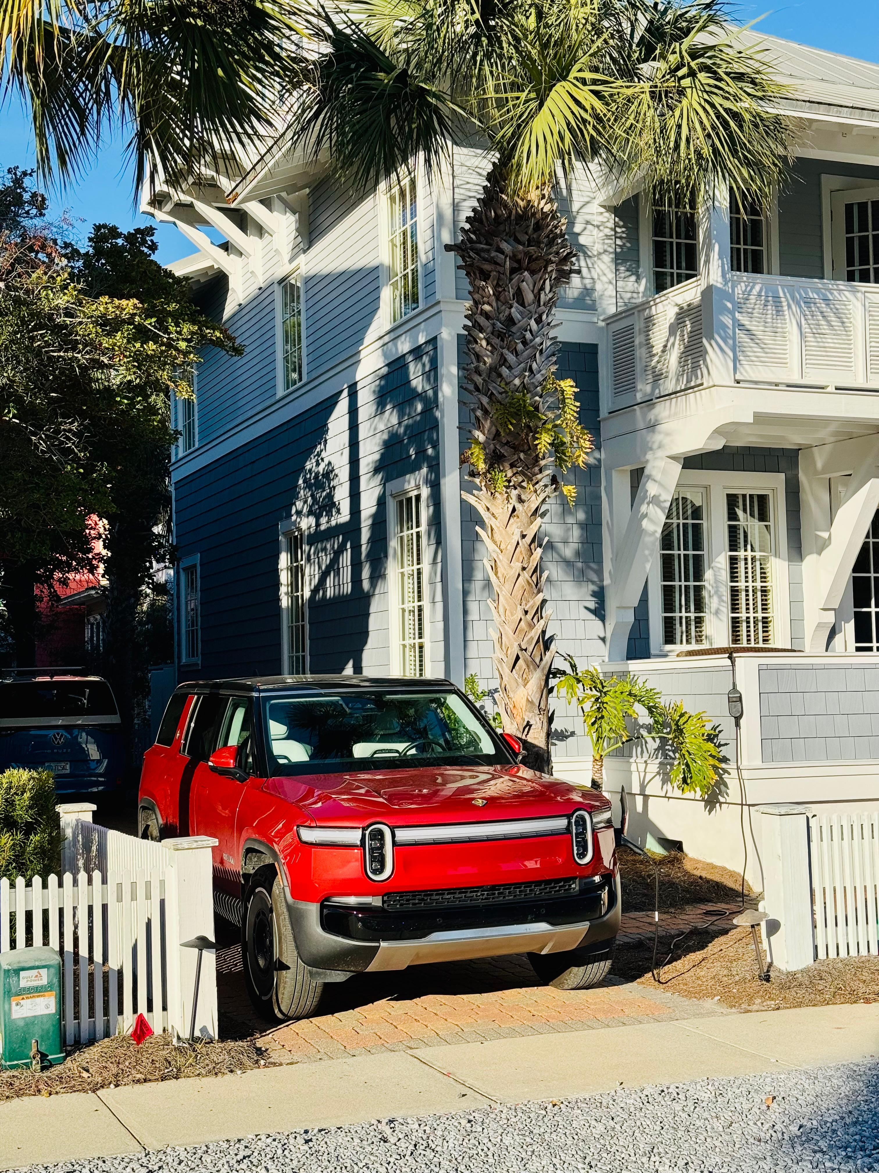 Front of the house. Don’t forget to park in the driveway or you’ll get a polite parking violation for parking in the golf cart area :) 