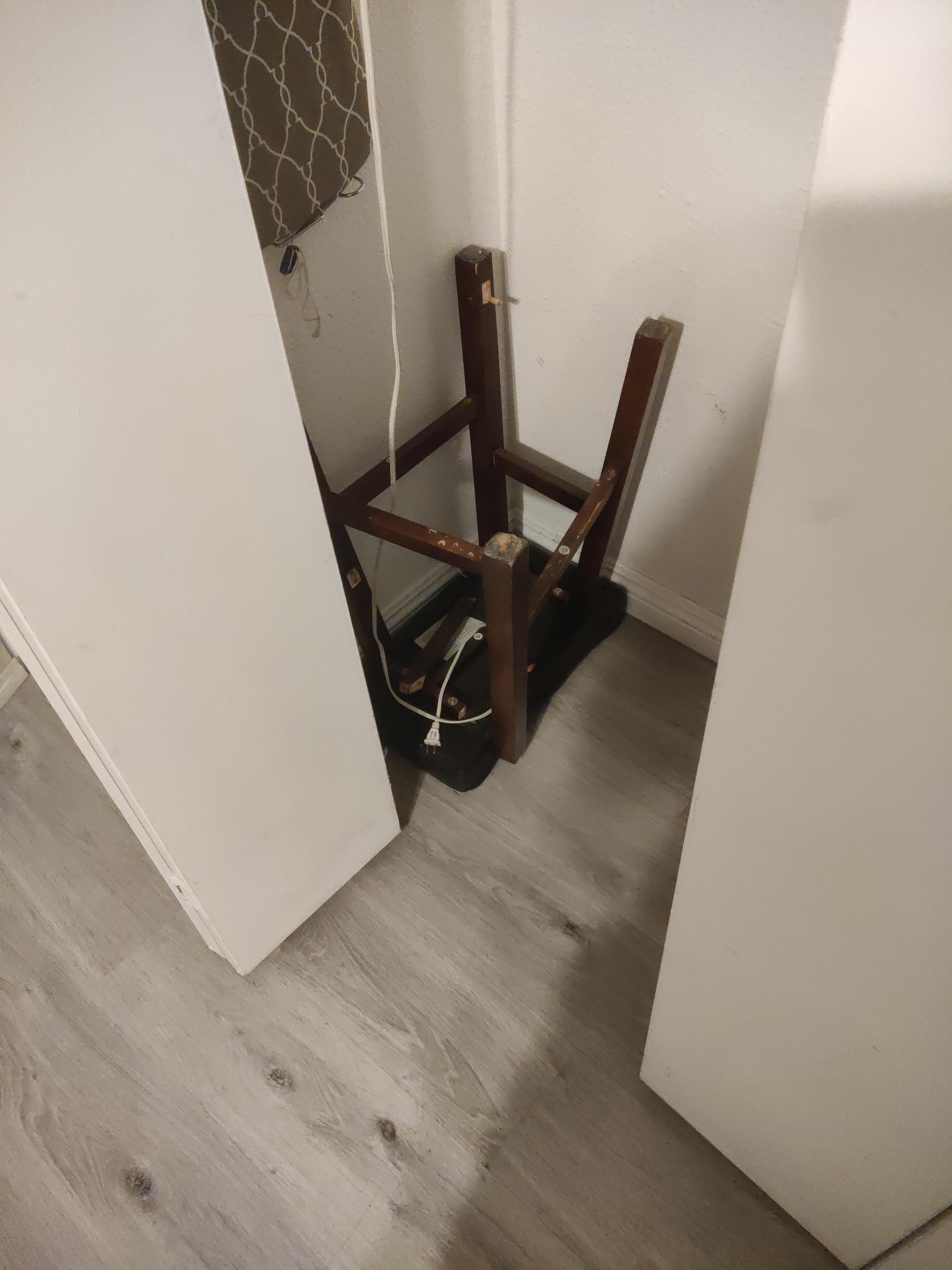 Damaged stool in closet 