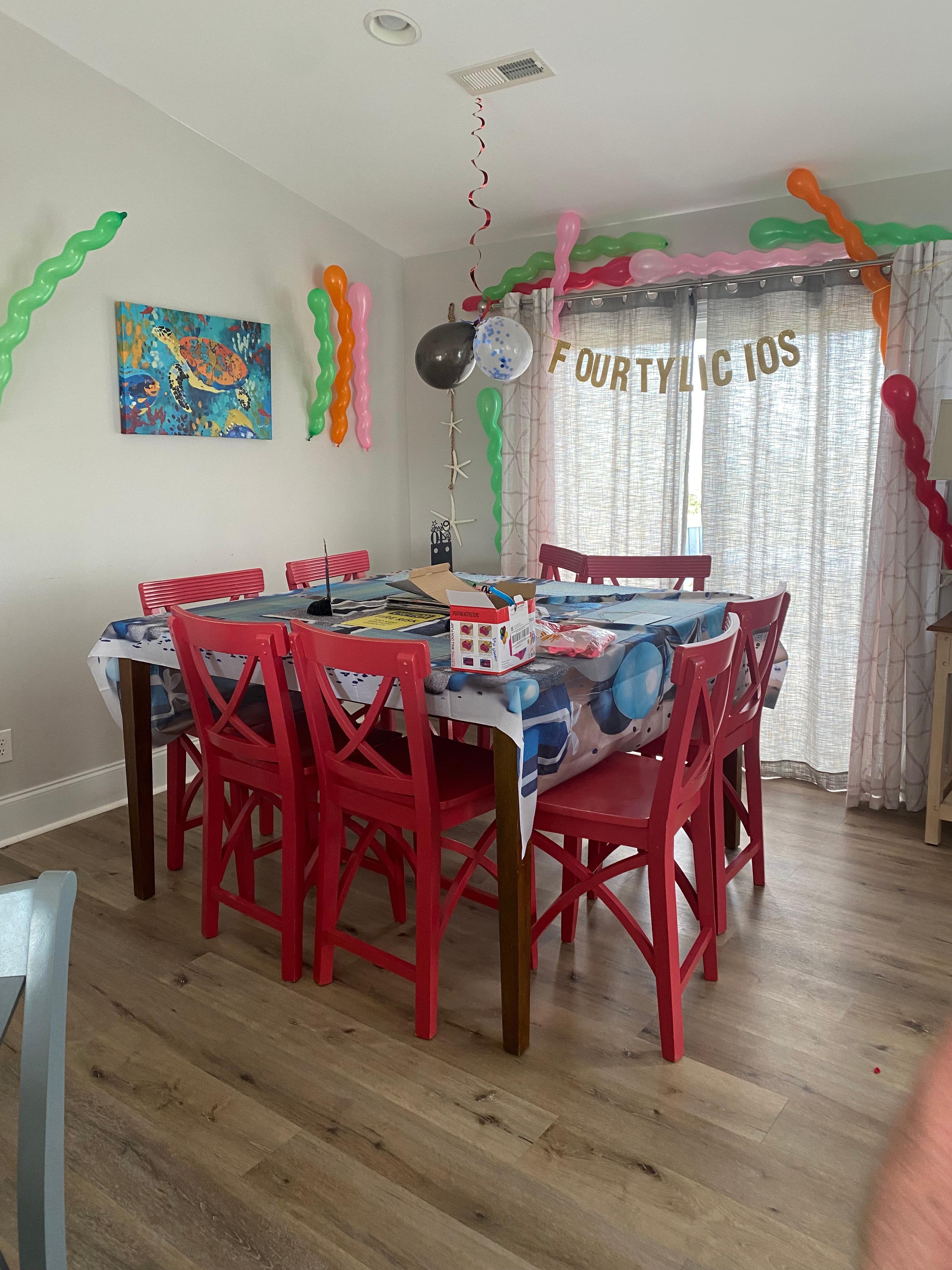 Big table seating plus eating bar and small kitchen table