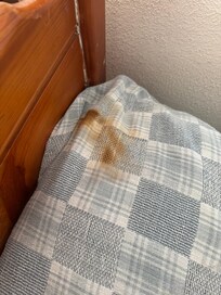 Housse de lit brûlée