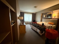 Deluxe Double - photo taken before checkout, hence bed is not made yet