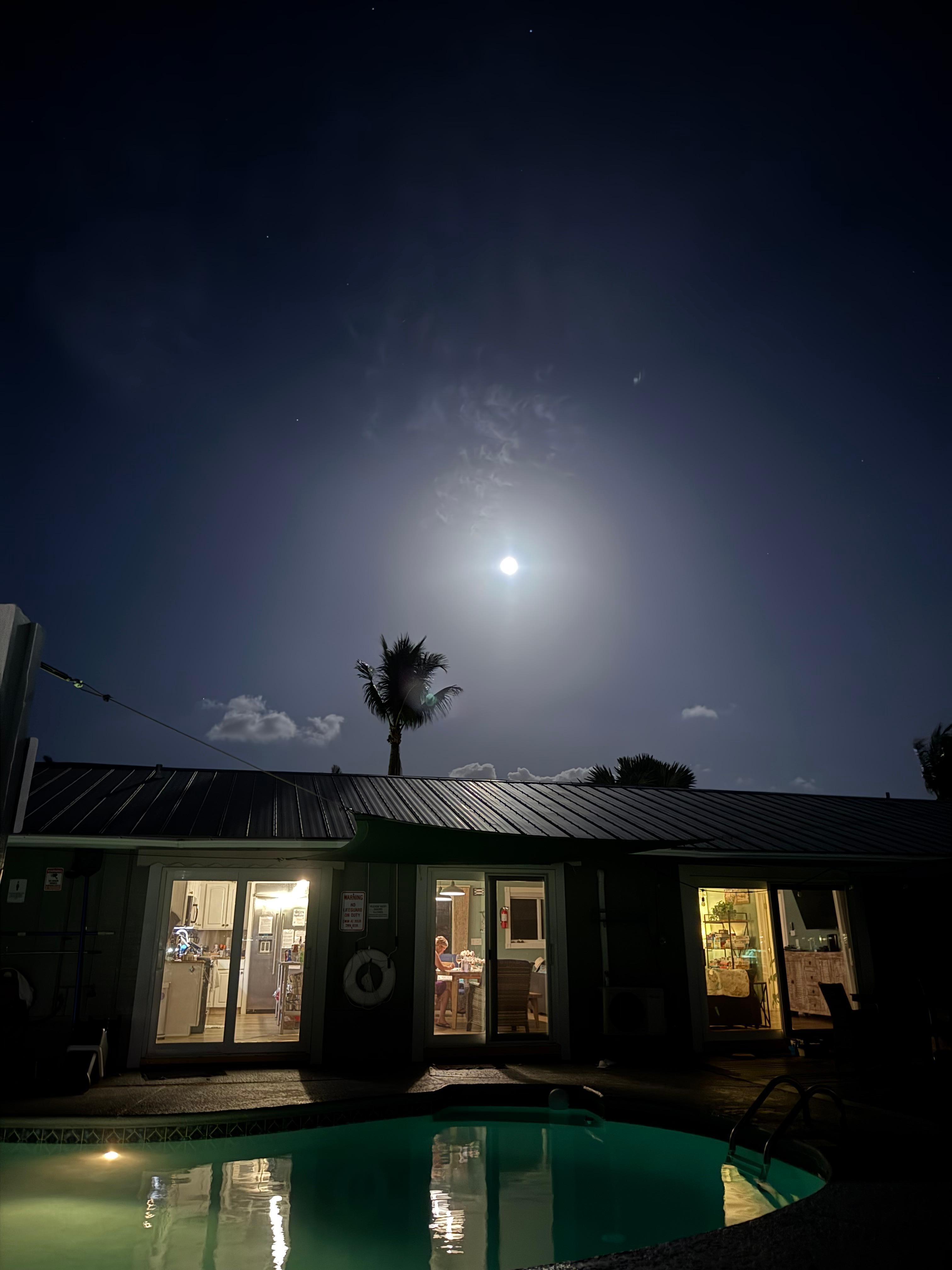 Full Moon rising over the house and pool. 