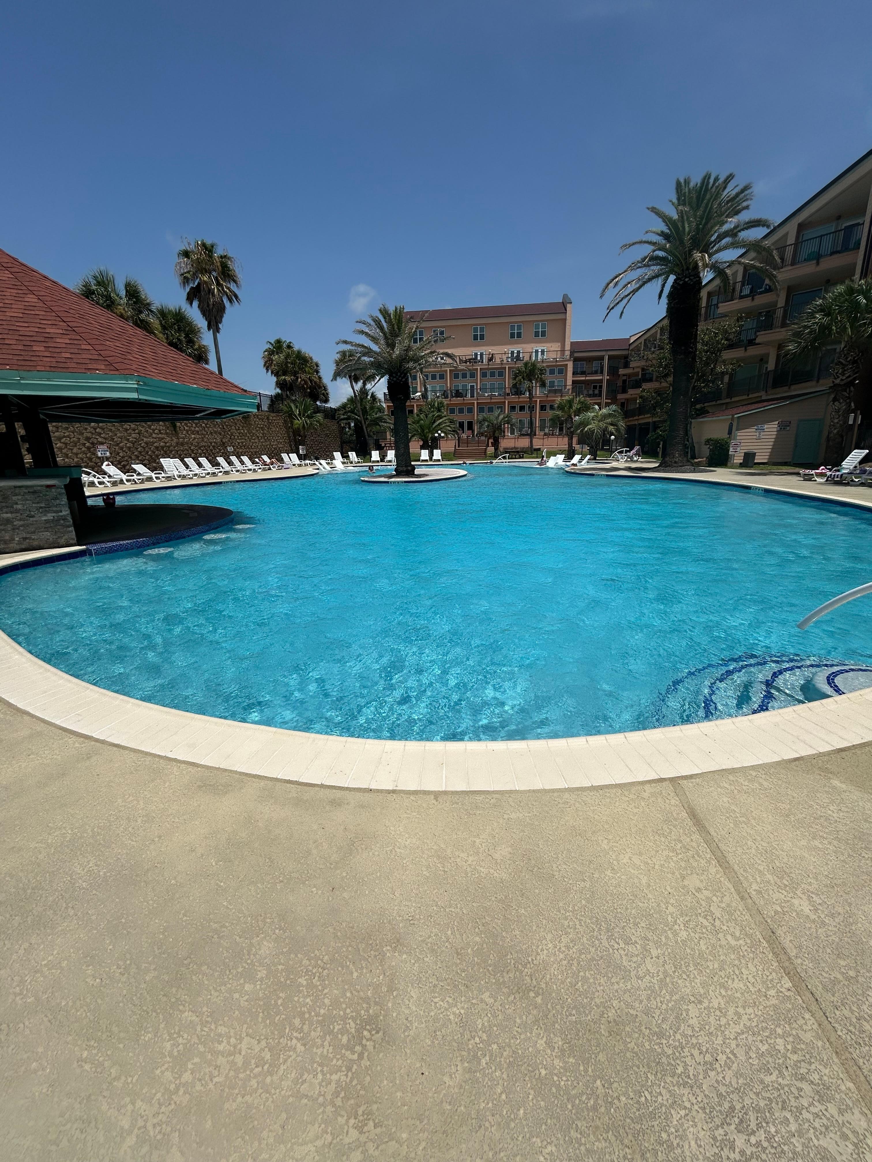 Beautiful view of the larger pool. Clean and well maintained.
