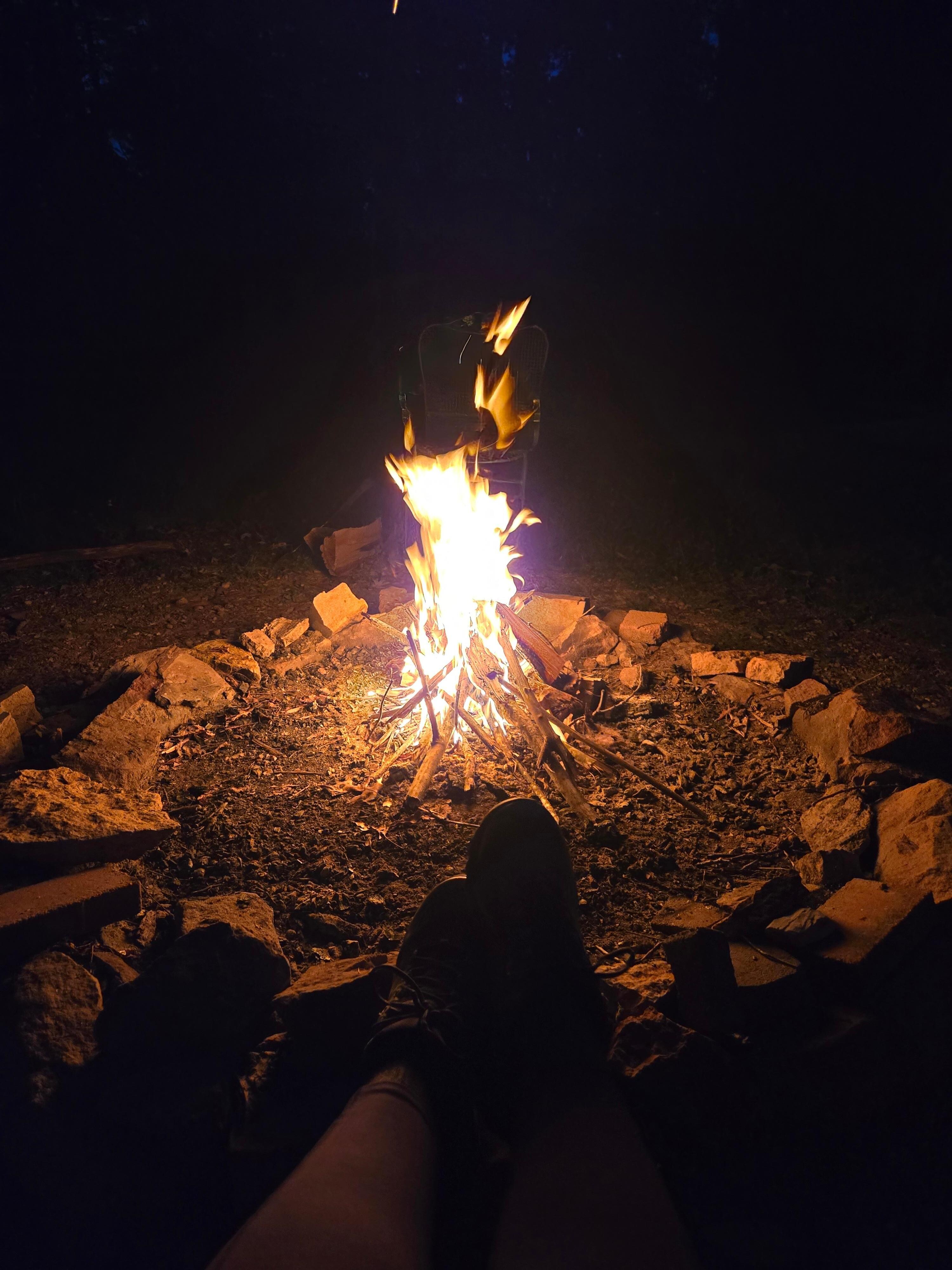 Campfire in the background at flying squirrel 