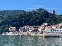 Moneglia beach, a safe lagoon of crystal clear water and golden sand.