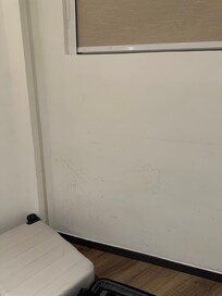 walls were completely scratched up and a ton of residue on the floor.