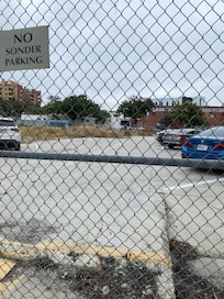 Left side of building with trash
