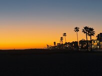 Sunset from the beach in front of the house.