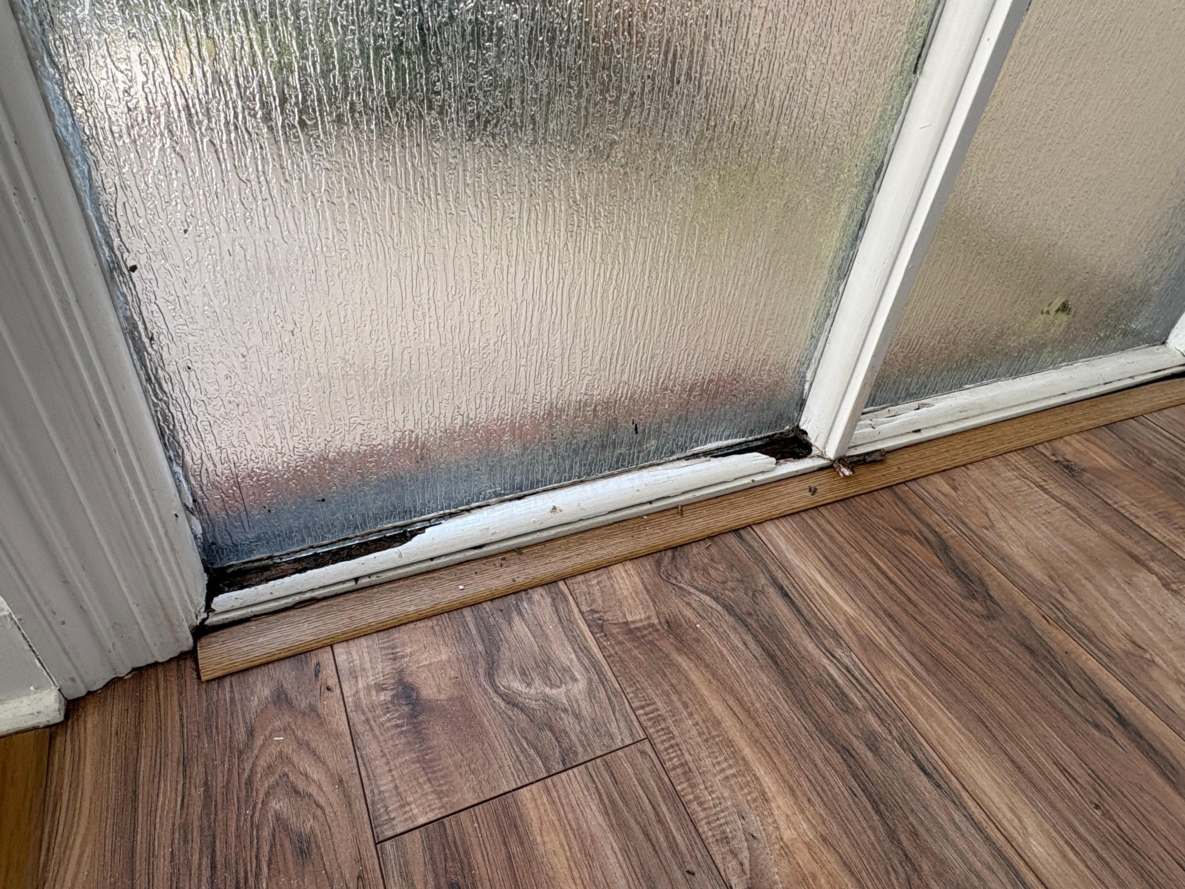 Rotting wood in entrance windows 