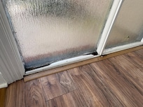 Rotting wood in entrance windows