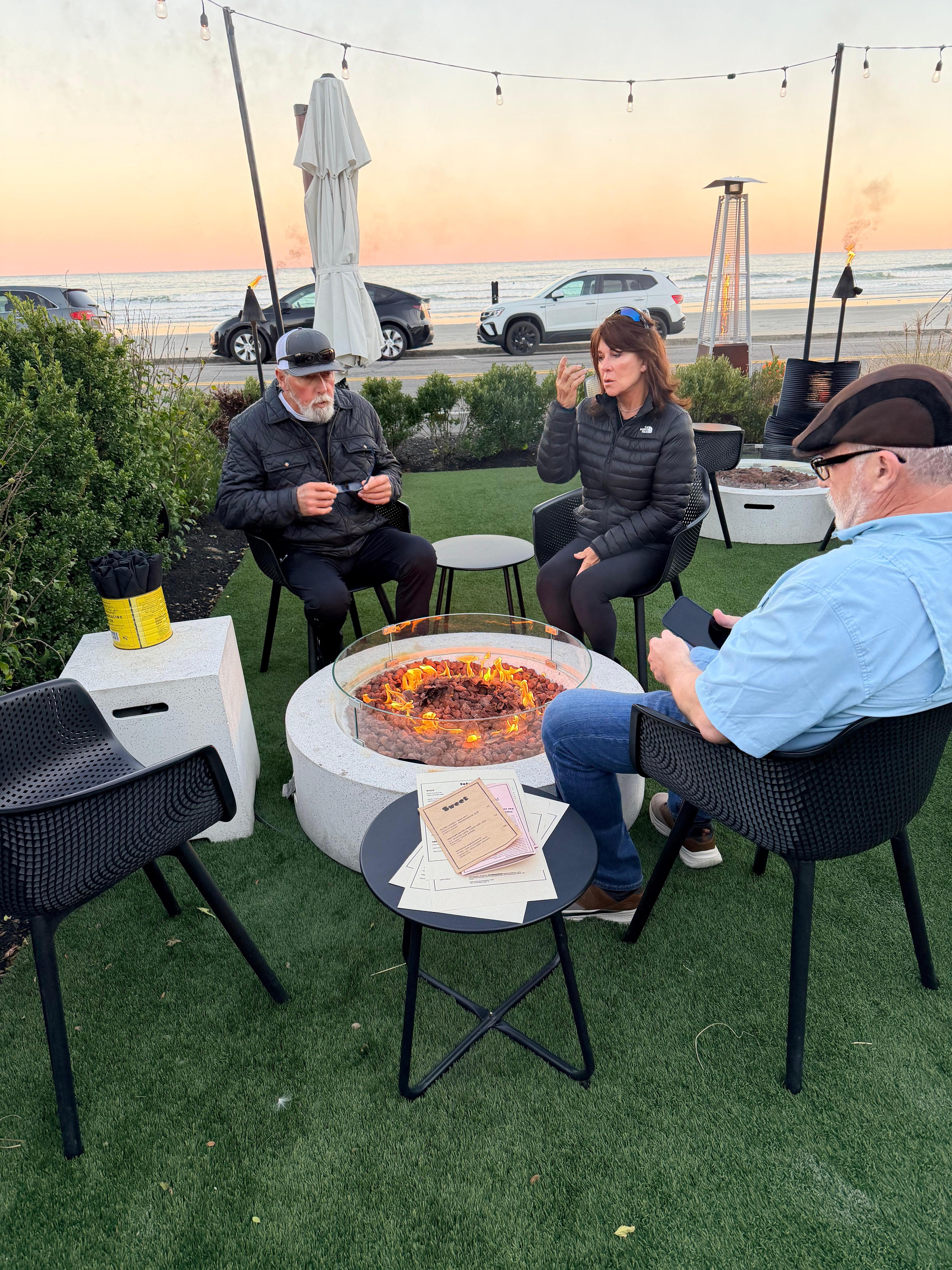 Outdoor seating with fire pit at Lulu’s. 