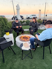 Outdoor seating with fire pit at Lulu’s.