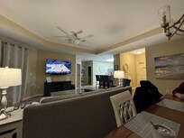 Living room into kitchen view from dining room - played many games of Euchre at night!