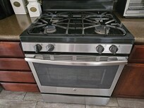 Broken stove that made the house smell like gas when we first arrived