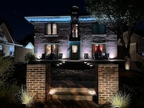 Photo of the outside at night. Nice seating area to enjoy outside