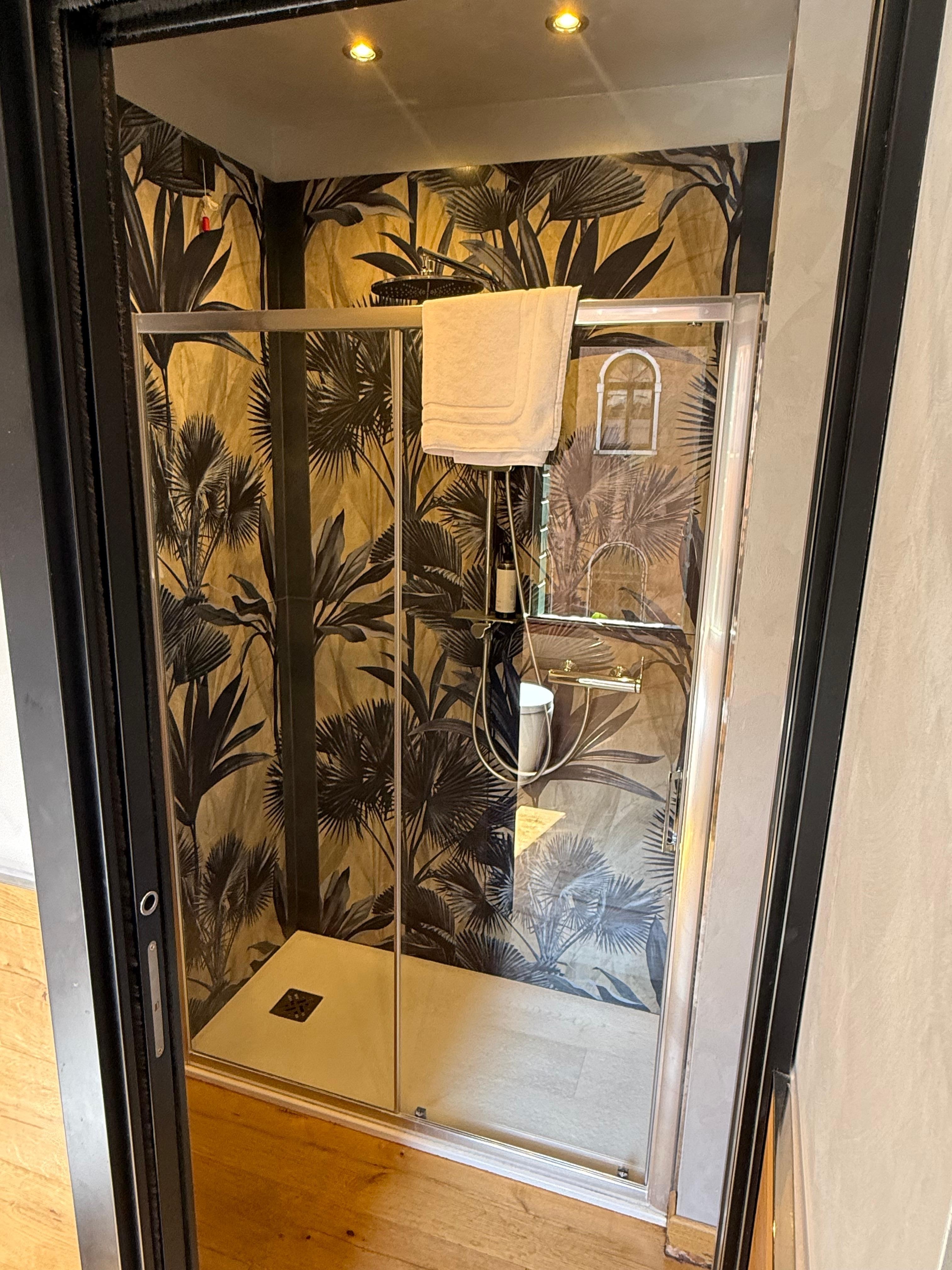 I just love a unique shower and the tile in here made me smile