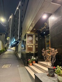 Hotel entrance in the ally