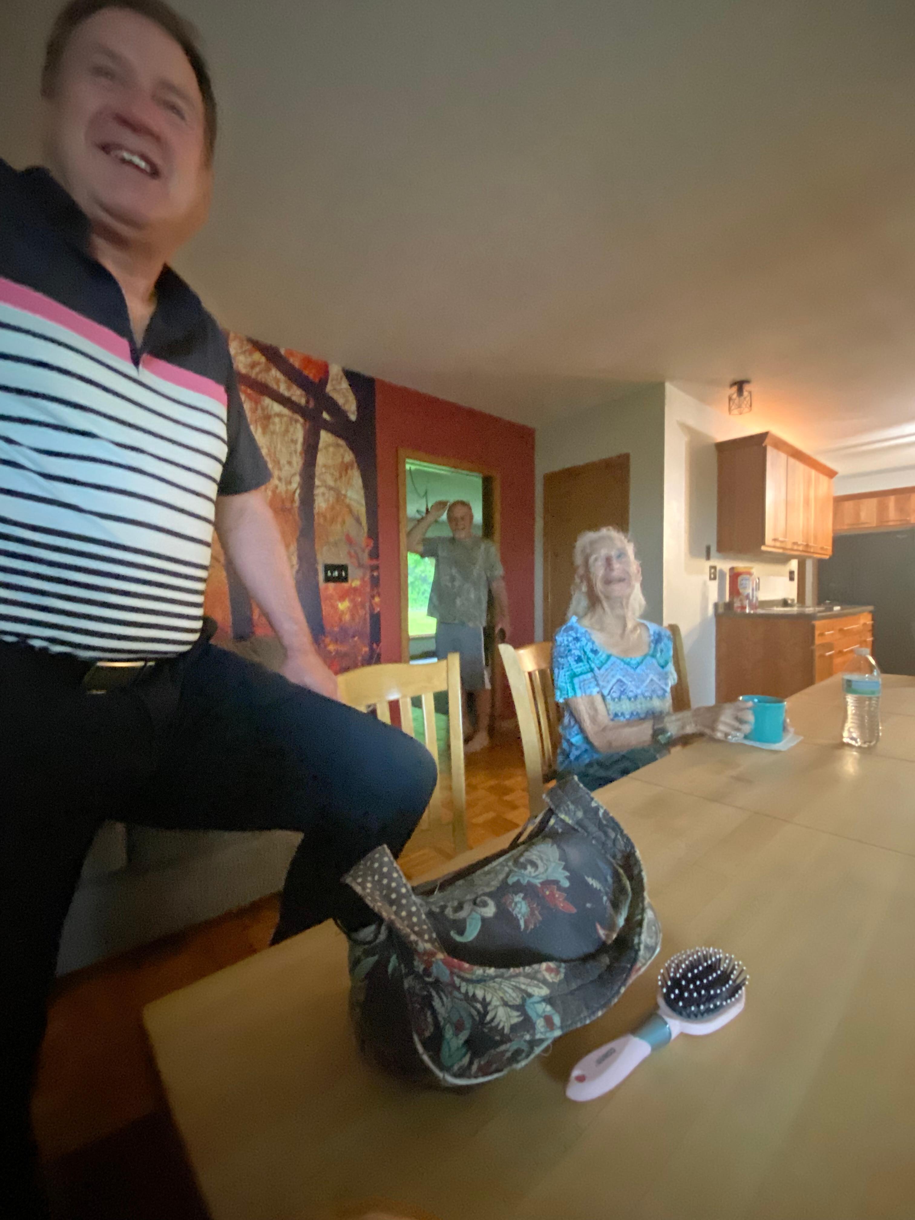 Family conversations and games in kitchen!