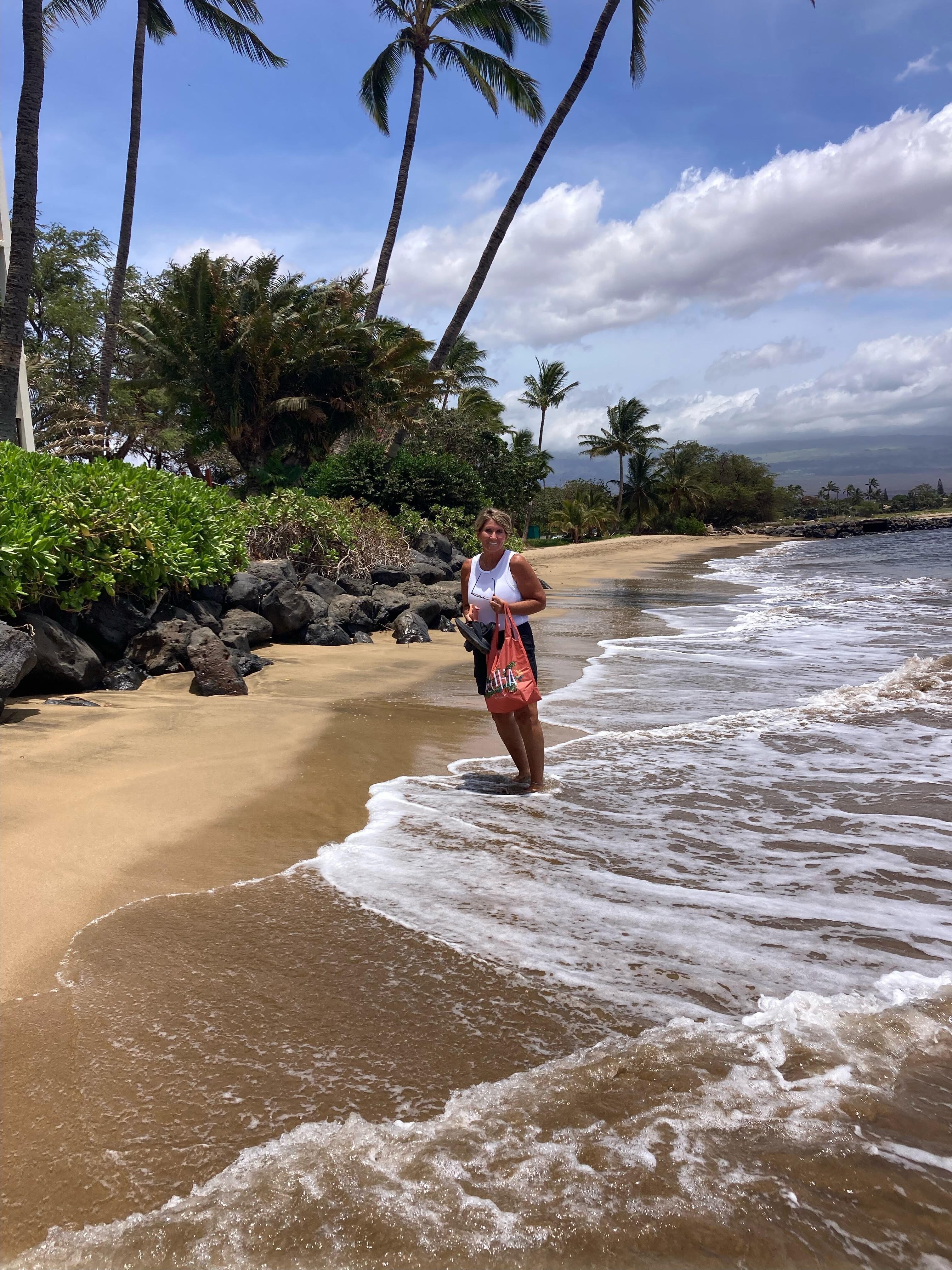 Walking on the long beautiful beach to the market.