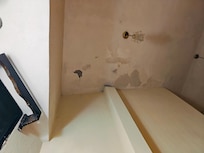 Plaster and paint falling from the ceiling