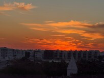 The balcony is the perfect spot to watch the sun set.