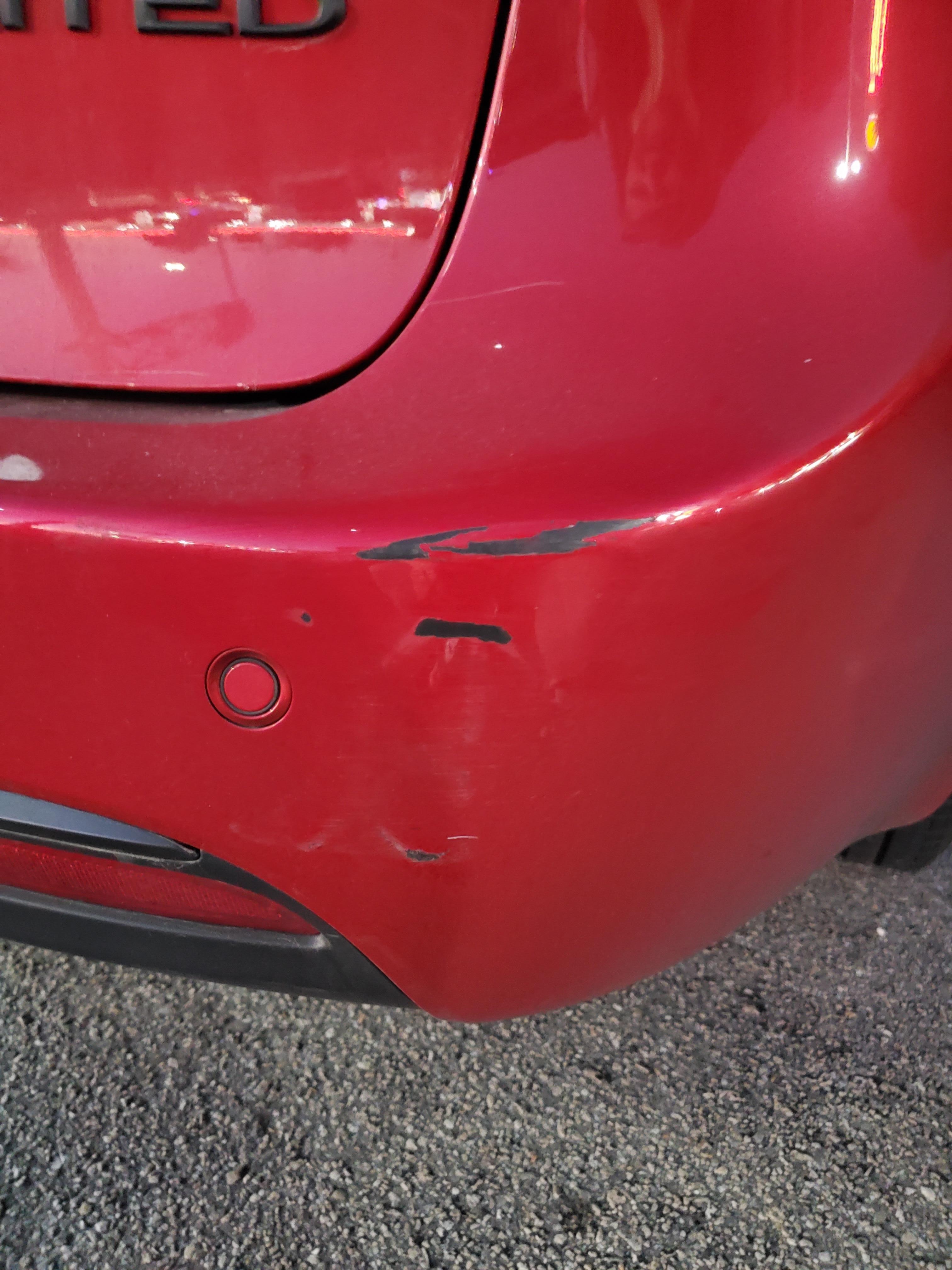 People don't know how to park in the parking garage. They ran into my car