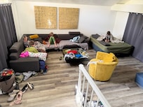 Large living room where the kids slept on the sofa and still fit 2 air mattresses in the corner of the room.