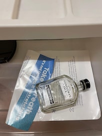 Liquor bottle in kids’ room