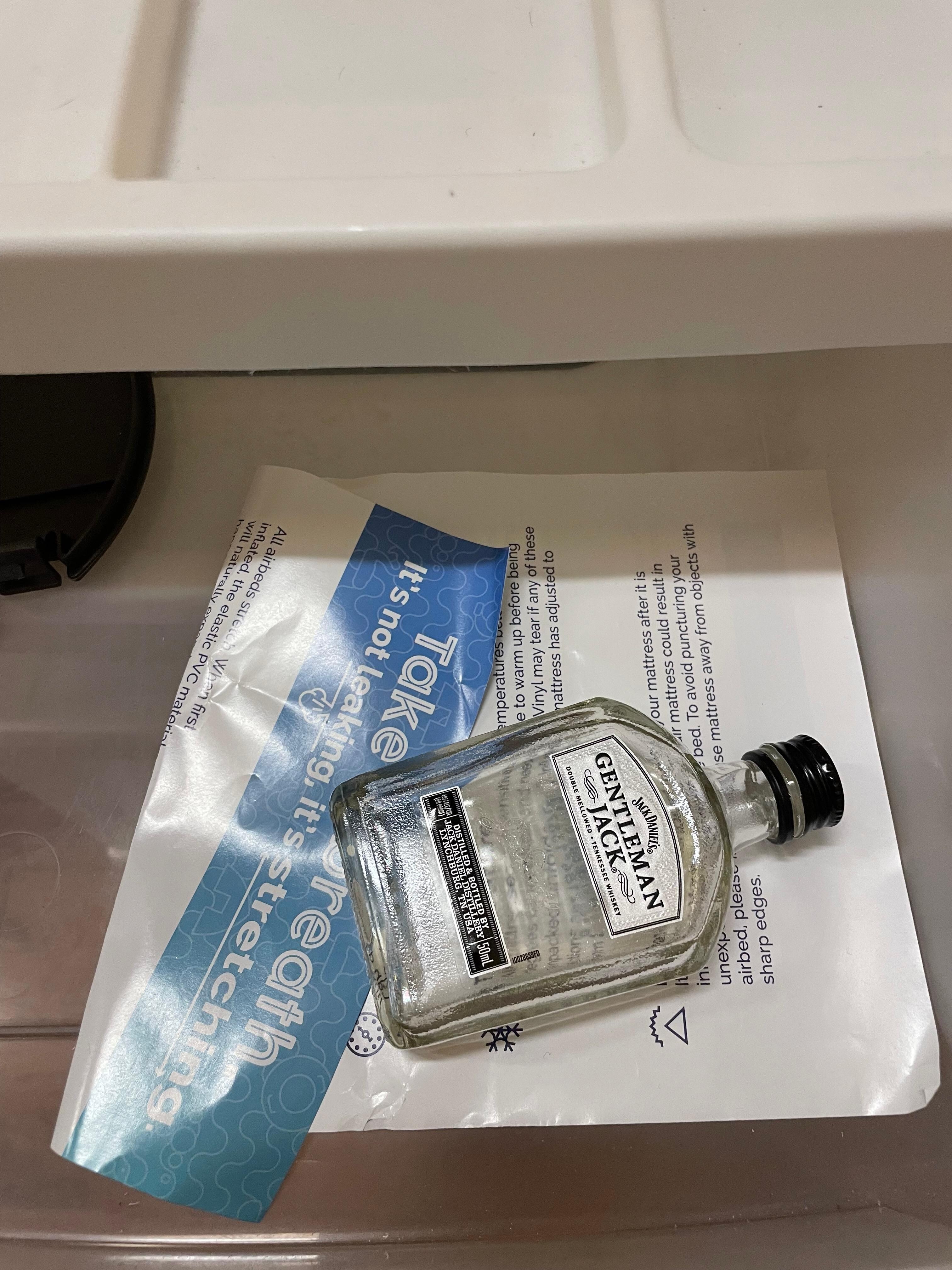 Liquor bottle in kids’ room