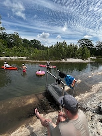Kayaks and paddle board fun at the cabin with its water access! The hosts provide the water toys!