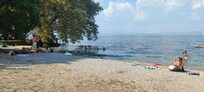 The little beach on the lake within easy walking distance.
The view of the pedestrianised street from our room.