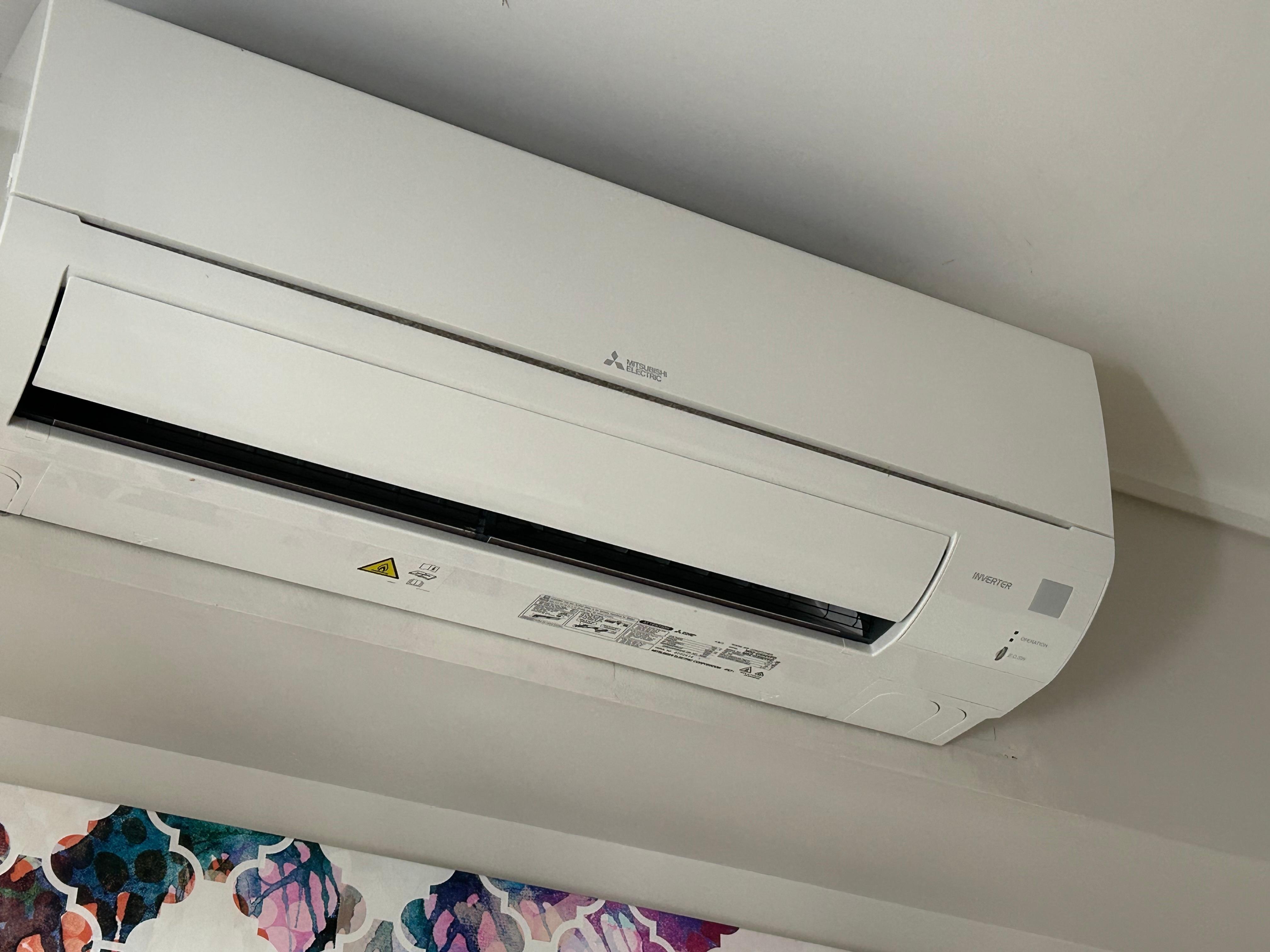 Air conditioning unit missing cover at the bottom