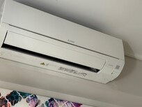 Air conditioning unit missing cover at the bottom