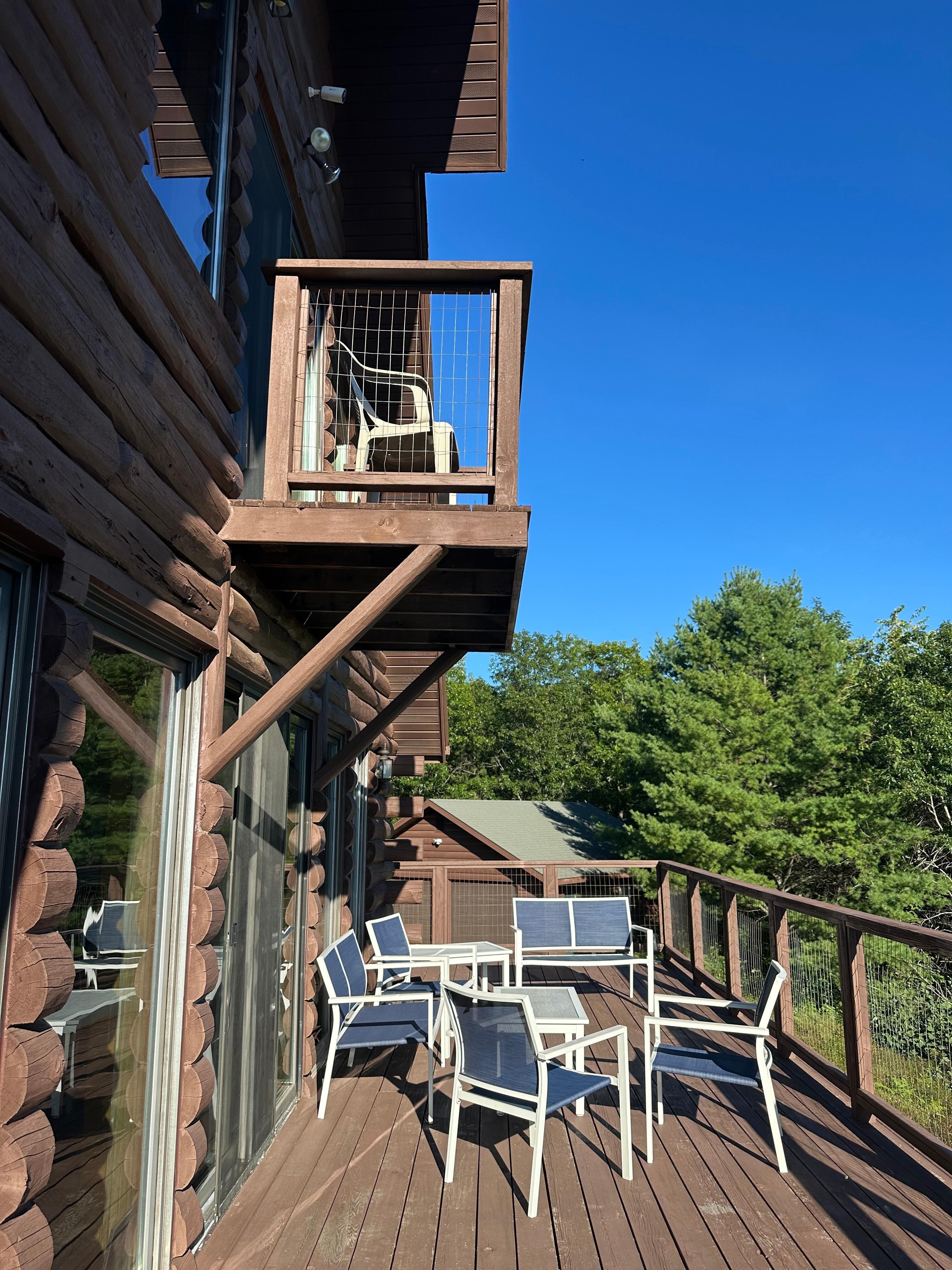 Patio and upstairs balcony