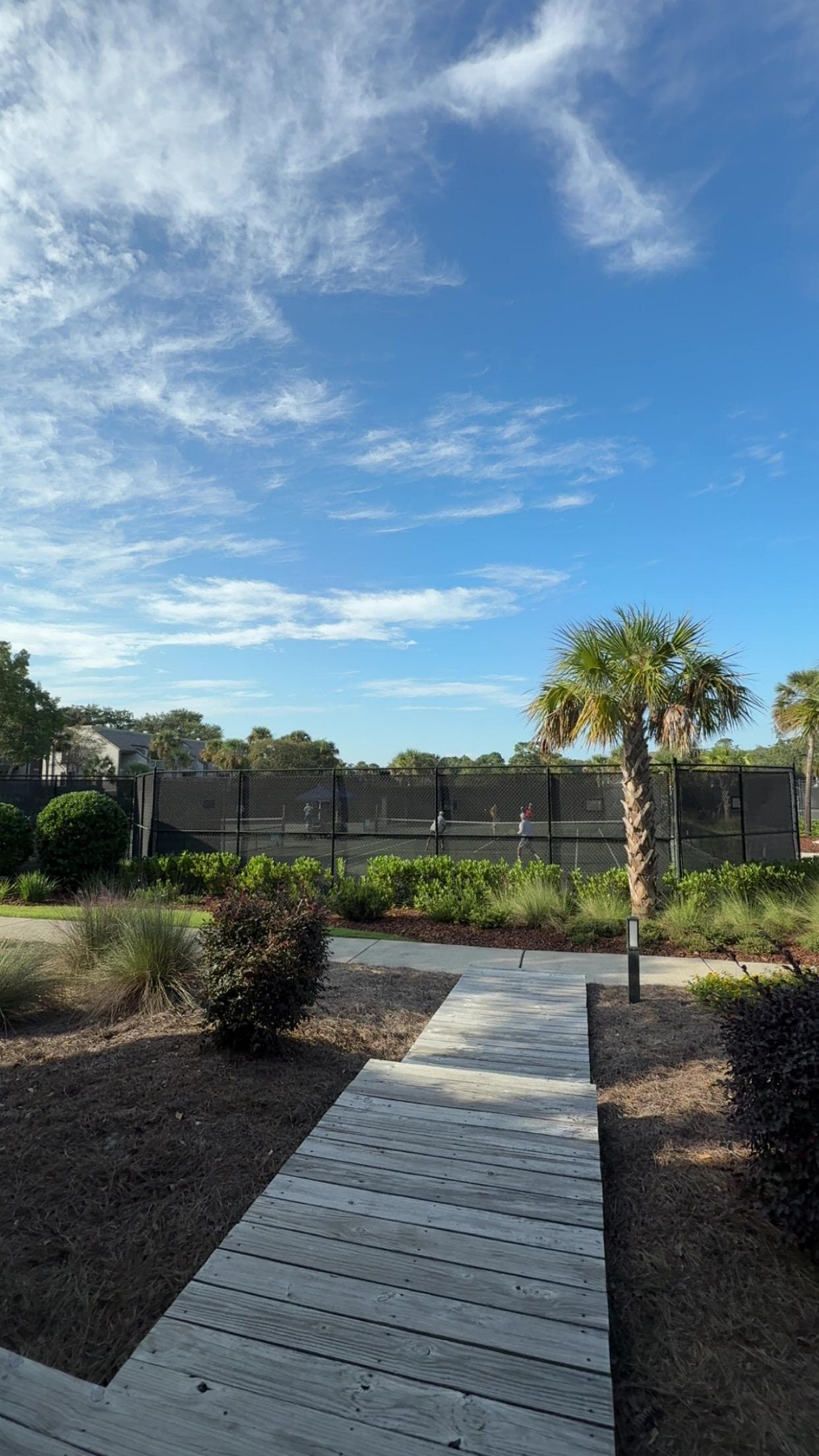 A gorgeous racquet club just steps from the deck! 