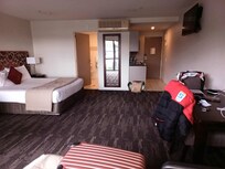 Our room incl lounge, tabke and chairs, super king bed & spare single.